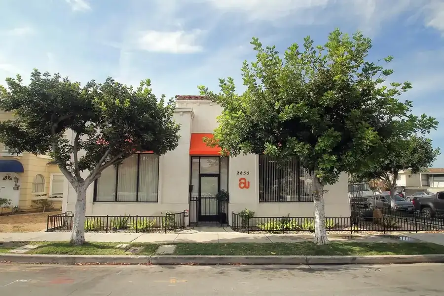 Art's Washers & Dryers family office in Normal Heights, San Diego, with its signature orange awnings