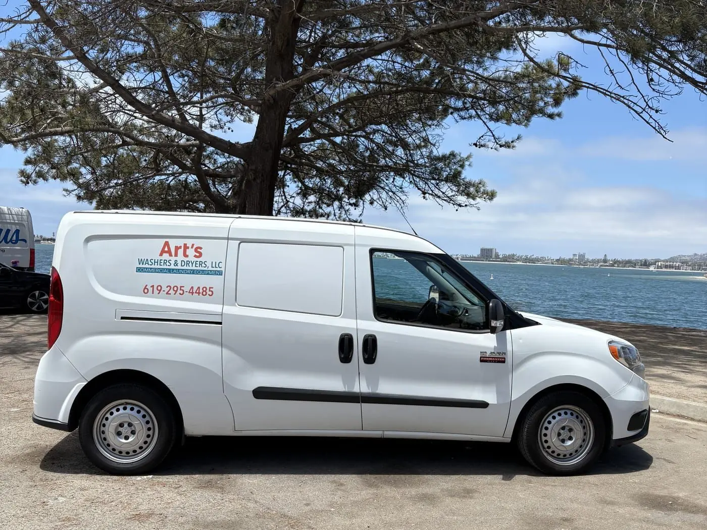 Art's Washers & Dryers wrapped service van along San Diego's Mission Bay
